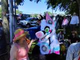 My wife talking with a furry at Pride.